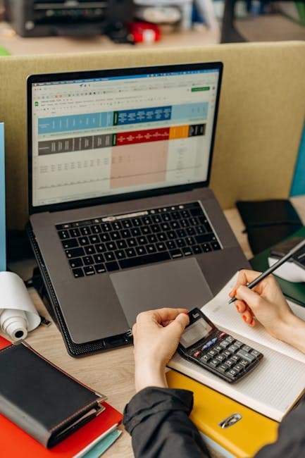 Manual payment processing with spreadsheets - Photo by Mikhail Nilov from Pexels
